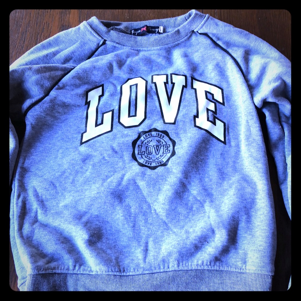 A gray love sweatshirt